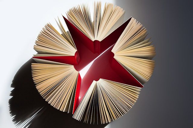 Five opened books forms a star-like shape