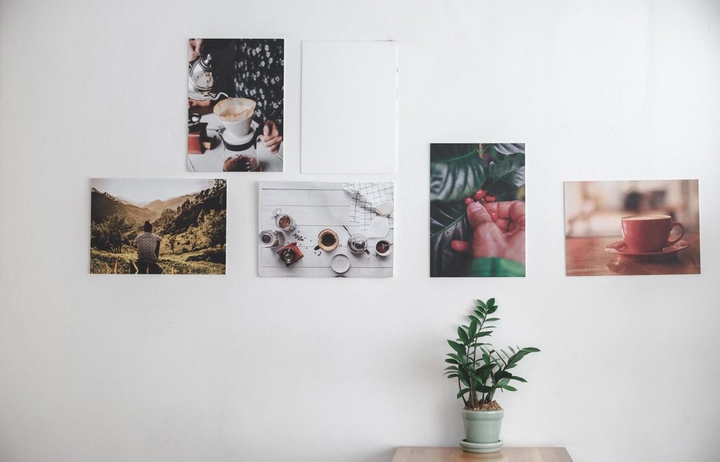 white wall with photographs